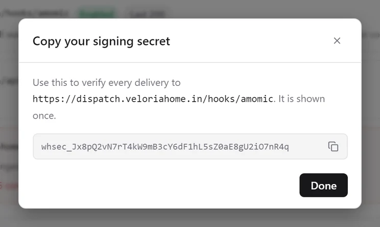 The Copy your signing secret dialog showing a whsec_ secret for the new endpoint