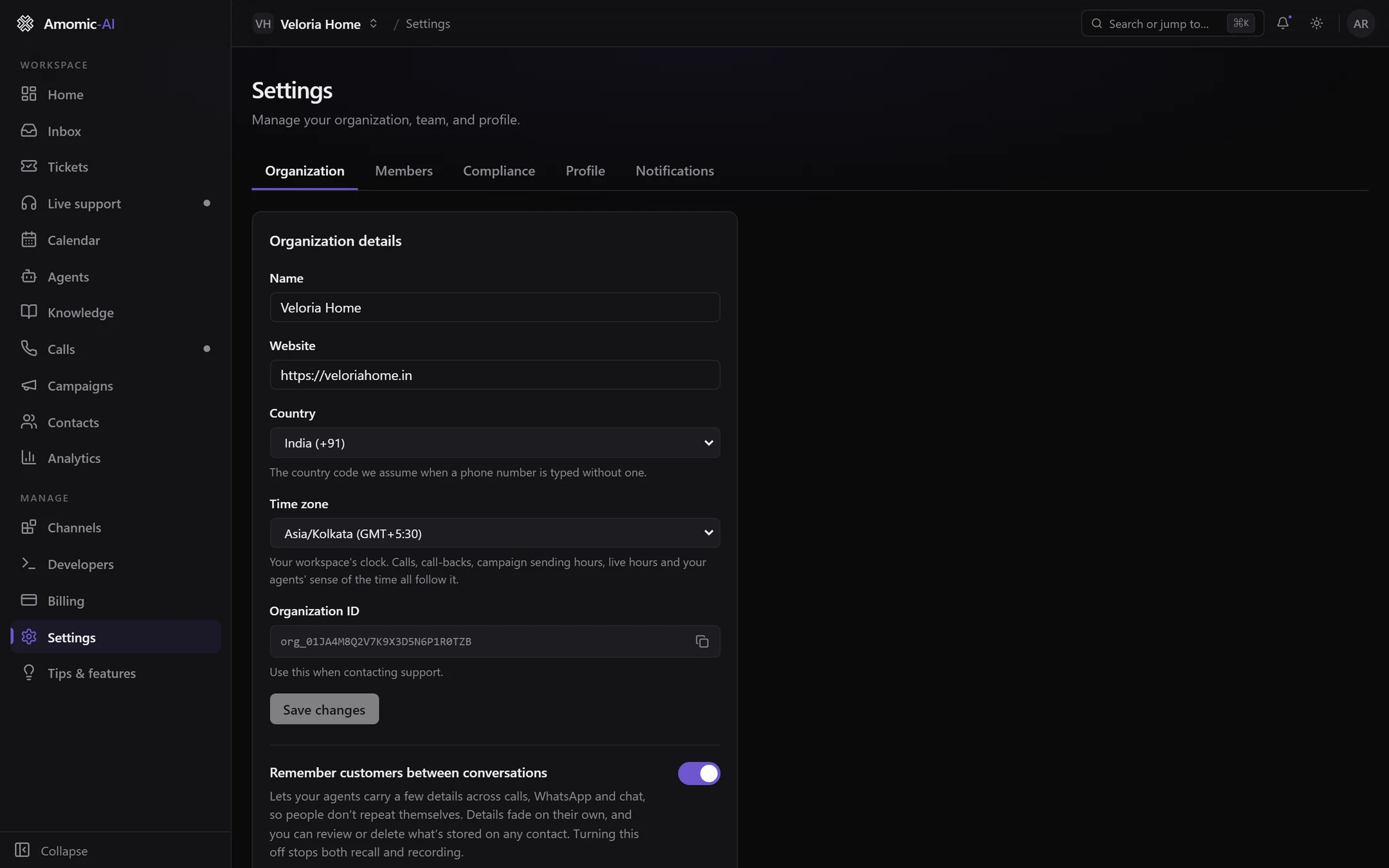 The Organization tab: Name Veloria Home, Website, Country India (+91), Time zone Asia/Kolkata, Organization ID with a copy button, and the Remember customers between conversations switch